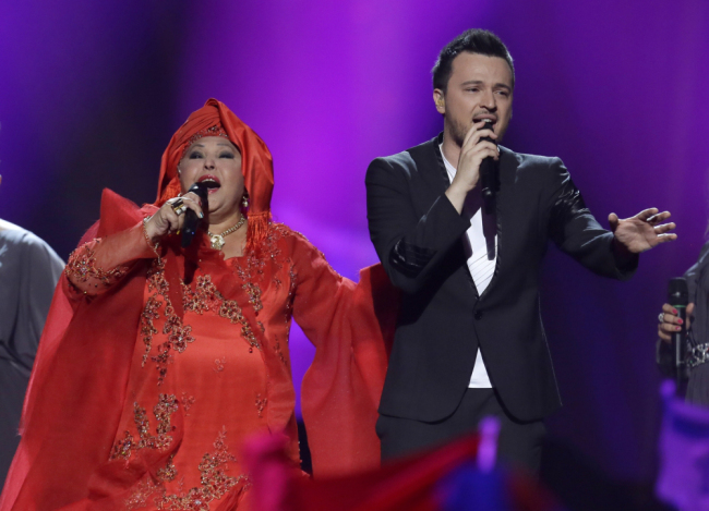 Esma and Lozano of Macedonia sing their song Pred Da Se Razdeni (Before the Sunrise) during the second semifinal of the Eurovision Song Contest at the Malmo Arena in Malmo, Sweden, Thursday, May 16, 2013. (Photo/Alastair Grant)