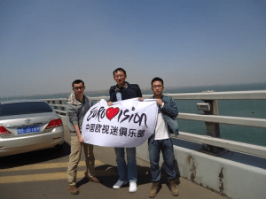 Chinese Eurovision Fans pictured with their Chinese Eurovision Flag on Jiaozhou Bay Bridge of Qingdao, China. Follow them on Twitter :@escfans_china and website http://chinaescfans.wordpress.com