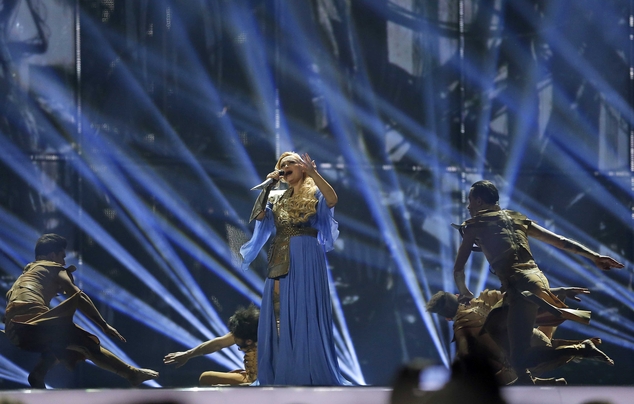 Singer Cristina Scarlat representing Moldova performs the song 'Wild Soul', during the first semifinal of the Eurovision Song Contest in the B&W Halls, in Copenhagen, Denmark, Tuesday, May 6, 2014. (AP Photo/Frank Augstein)